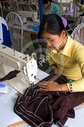 Disadvantaged Vietnamese youth learn to use a sewing machine at a vocational school named Kids First Vietnam in Dong Ha, Vietnam.