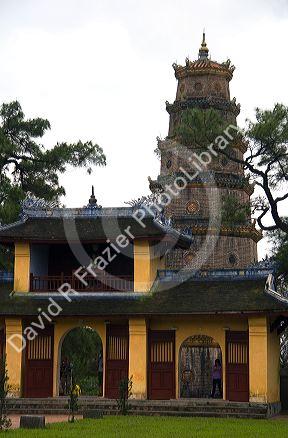 Religious buildings within the grounds of the Thien Mu Pagoda in Hue, Vietnam.