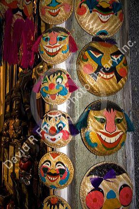 Painted ceremonial masks being sold for Tet in Hanoi, Vietnam.