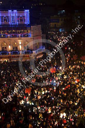 Crowds of people celebrate during Tet festivities in the historical center of Hanoi, Vietnam.