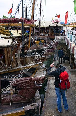 Tourist boats at the port of Ha Long Bay, Vietnam.