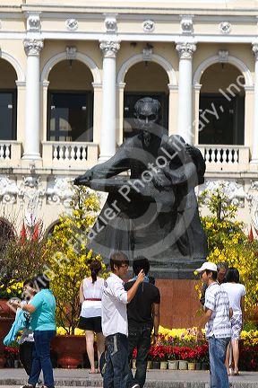 Ho Chi Minh statue in front of Ho Chi Minh City Hall in Vietnam.