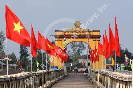 Memorial portal to Ho Chi Minh at the Hien Luong Bridge spanning the Ben Hai River in Quang Tri Province, Vietnam.