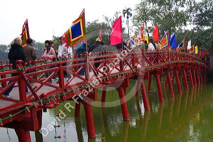 The Huc Bridge on Hoan Kiem Lake in Hanoi, Vietnam.