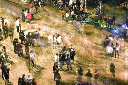 Crowds of people celebrate during Tet festivities in Hanoi, Vietnam.