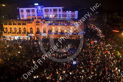 Crowds of people celebrate during Tet festivities in the historical center of Hanoi, Vietnam.