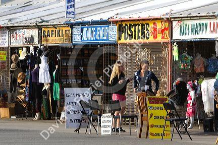 People and boardwalk retail space at Venice Beach, Los Angeles, California.