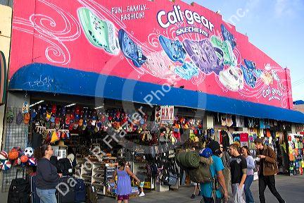 People and boardwalk retail space at Venice Beach, Los Angeles, California.