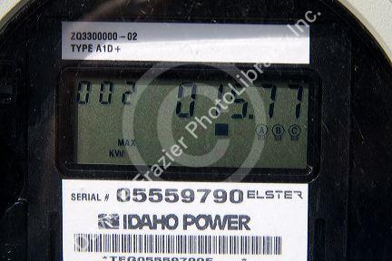 Digital eletricity meter displays use and rate of consumption to consumer in Boise, Idaho, USA.