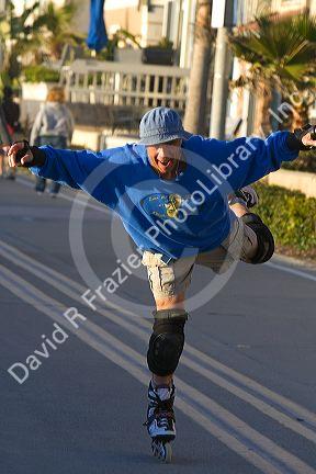 Man rollerblading at Mission Beach in San Diego, Southern California, USA.