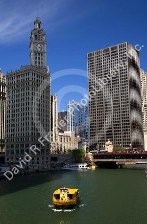 Water taxi on the Chicago River in downtown Chicago, Illinois, USA.