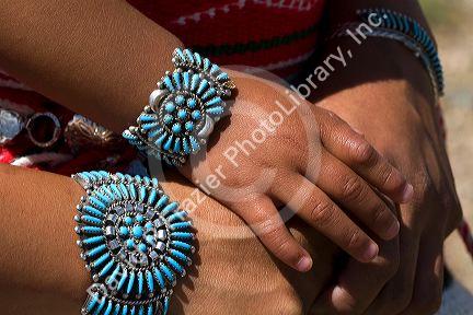 Turquoise bracelets crafted and worn by a Navajo Indian mother and daughter from Arizona, USA. MR