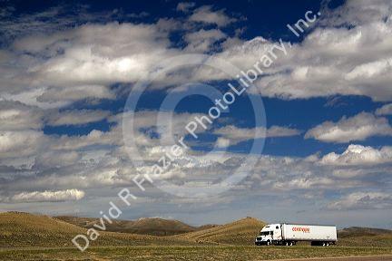 Long haul truck traveling on Interstate 80 in Carbon County, Wyoming, USA.