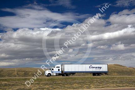 Long haul truck traveling on Interstate 80 in Carbon County, Wyoming, USA.