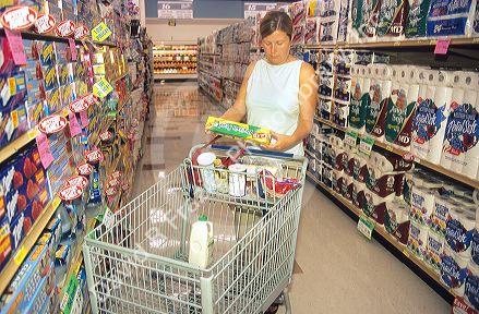 Woman shopping in a grocery store.