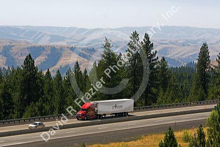 Truck transporting freight through the Blue Mountains near Pendleton, Oregon, USA.