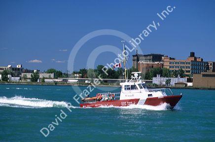 A Canadian coastguard boat patrols the Detroit River between Michigan and Windsor, Ontario.