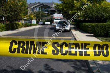 Police crime scene tape warning against entering a crime area in Boise, Idaho, USA.