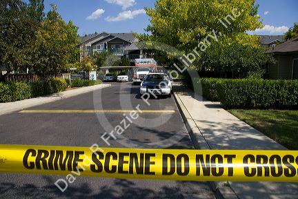 Police crime scene tape warning against entering a crime area in Boise, Idaho, USA.