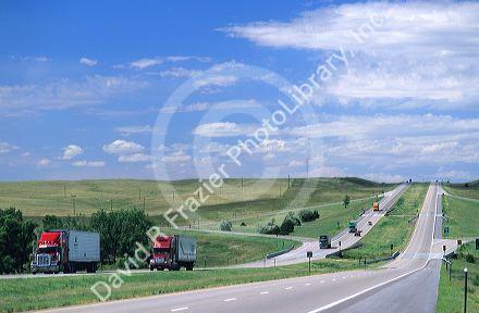 Trucks travel on Interstate 80 near Lodgepole, Nebraska.  View looking west.