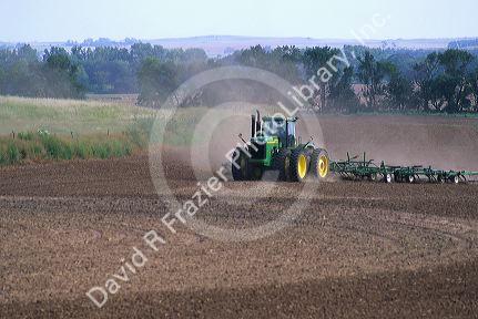 Eight wheel tractor making turns in Lincoln County, Kansas east of the town of Lincoln.