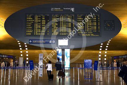 Departure board located in the Paris-Charles de Gaulle Airport, Paris, France.