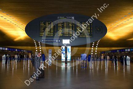 Departure board located in the Paris-Charles de Gaulle Airport, Paris, France.