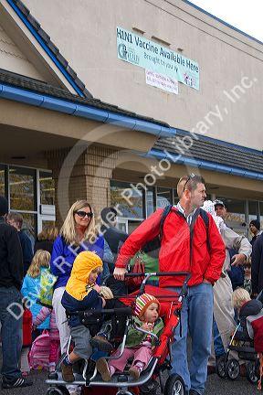 People wait in line for the H1N1 influenza vaccine in Boise, Idaho.