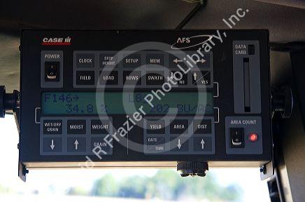 Computer GPS inside a combine corn harvester in Ada County, Idaho.