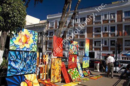 Sidewalk art being sold in the city of Puebla, Puebla, Mexico.