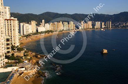 Acapulco Bay lined with hotels in Acapulco, Guerrero, Mexico.