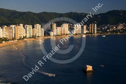 Acapulco Bay lined with hotels in Acapulco, Guerrero, Mexico.