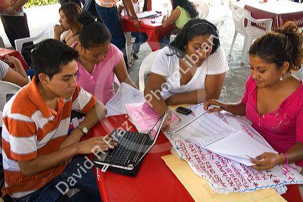 Mexican college students study together on the campus of Universidad Autonoma de Guerro located in Acapulco, Guerrero, Mexico.