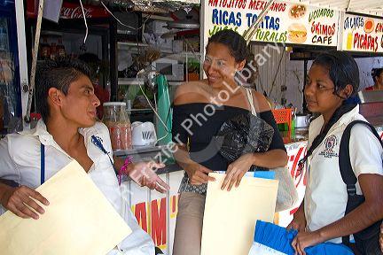 Mexican college students socialize on the campus of Universidad Autonoma de Guerro located in Acapulco, Guerrero, Mexico.