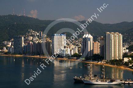 Acapulco Bay lined with hotels in Acapulco, Guerrero, Mexico.