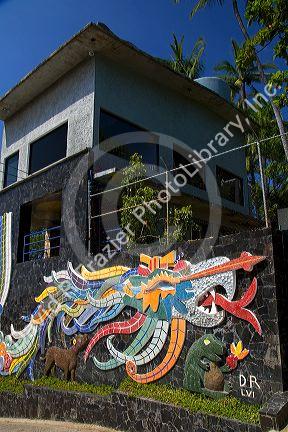 Mosaic artwork created by Diego Rivera along the outside wall of The House of the Winds where Dolores Olmedo Patino and Diego Rivera once lived, Acapulco, Guerrero, Mexico.