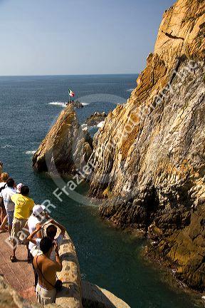 The La Quebrada Cliff Divers perform for the public from the cliffs of La Quebrada in Acapulco, Guerrero, Mexico.