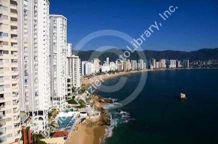 Acapulco Bay lined with hotels in Acapulco, Guerrero, Mexico.