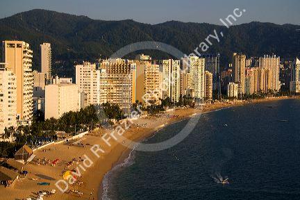Acapulco Bay lined with hotels in Acapulco, Guerrero, Mexico.
