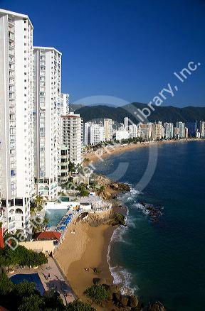 Acapulco Bay lined with hotels in Acapulco, Guerrero, Mexico.