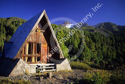 A-frame cabin in the Andes mountain range in Chile.
