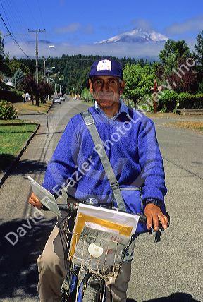 Postman on bicycle near Antuco, Chile.