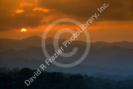 Sunset over the Cordillera Central from the Arenal Volcano National Park near La Fortuna, San Carlos, Costa Rica.