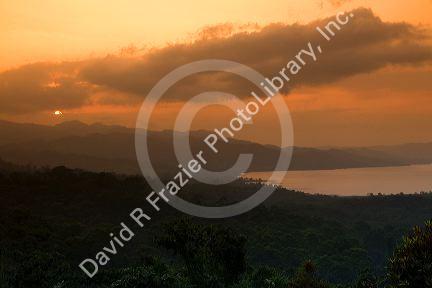 Sunset over the Cordillera Central from the Arenal Volcano National Park near La Fortuna, San Carlos, Costa Rica.