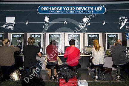 Electronic device recharging station at the Denver International Airport, Denver, Colorado, USA.