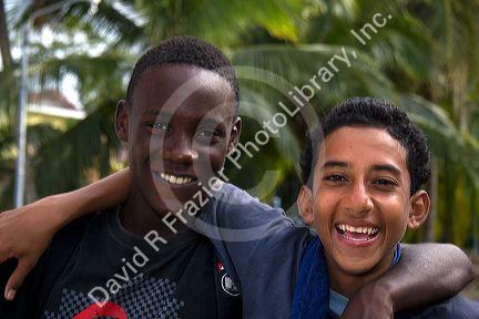 Costa Rican afro-caribbean teen with spanish native teen at Limon, Costa Rica.