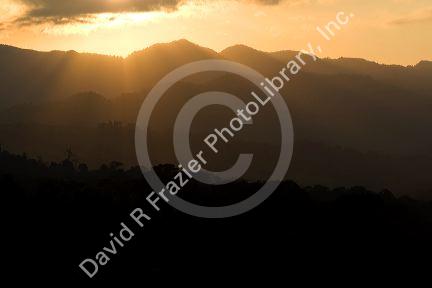 Sunset over the Cordillera Central from the Arenal Volcano National Park near La Fortuna, San Carlos, Costa Rica.