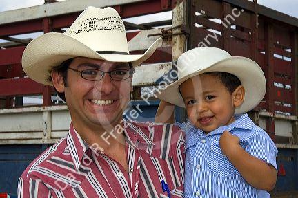 Costa Rican rancher and his son at Liberia, Costa Rica. MR