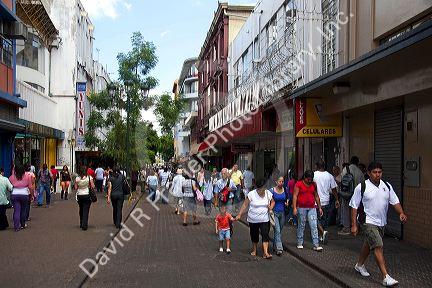 Pedestrians on a walking street in San Jose, Costa Rica.
