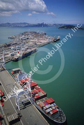 Container ship being loaded at the port in Oakland, California.